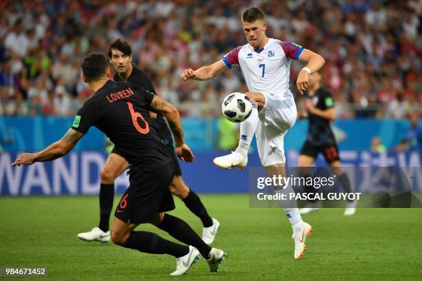 Croatia's defender Dejan Lovren vies with Iceland's midfielder Johann Gudmundsson during the Russia 2018 World Cup Group D football match between...