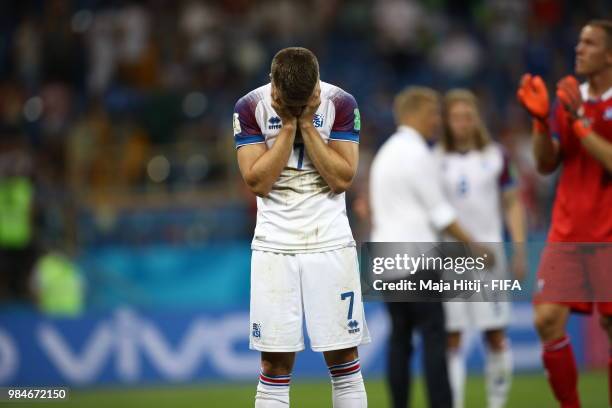 Johann Gudmundsson of Iceland stands dejected following the 2018 FIFA World Cup Russia group D match between Iceland and Croatia at Rostov Arena on...