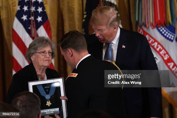 President Donald Trump presents the Medal of Honor to Pauline Lyda Wells Conner , widow of U.S. Army First Lieutenant Garlin M. Conner, during an...