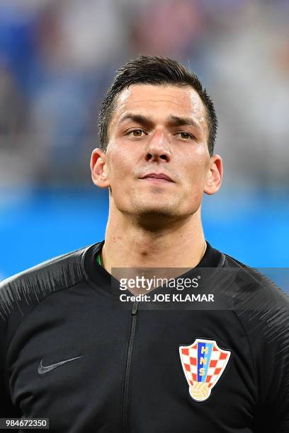 Croatia's goalkeeper Lovre Kalinic poses ahead of the Russia 2018 World Cup Group D football match between Iceland and Croatia at the Rostov Arena in...