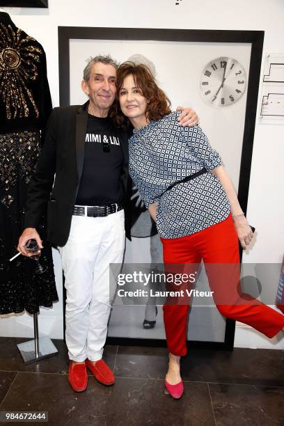 Designer Michel Klein and Actress Valerie Lemercier attend "Lili et Mimi sont au Premier" at Montaigne Market on June 26, 2018 in Paris, France.