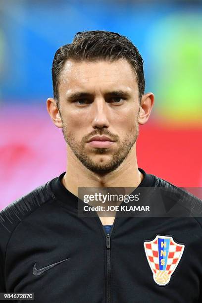 Croatia's defender Josip Pivaric poses ahead of the Russia 2018 World Cup Group D football match between Iceland and Croatia at the Rostov Arena in...