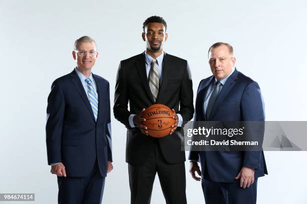 General manager Scott Layden, Keita Bates-Diop, and head coach Tom Thibodeau of the Minnesota Timberwolves pose for a portrait on June 26, 2018 at...