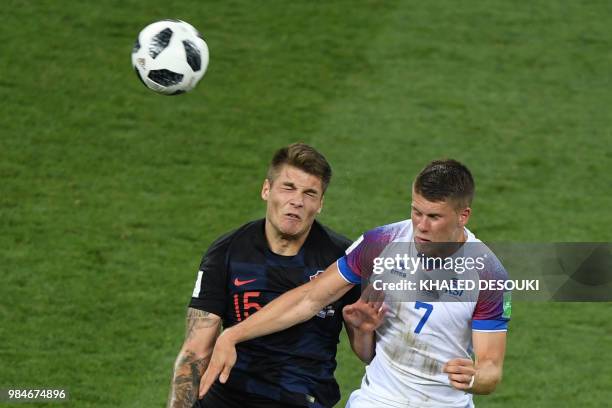 Croatia's defender Duje Caleta Car heads the ball Iceland's midfielder Johann Gudmundsson during the Russia 2018 World Cup Group D football match...