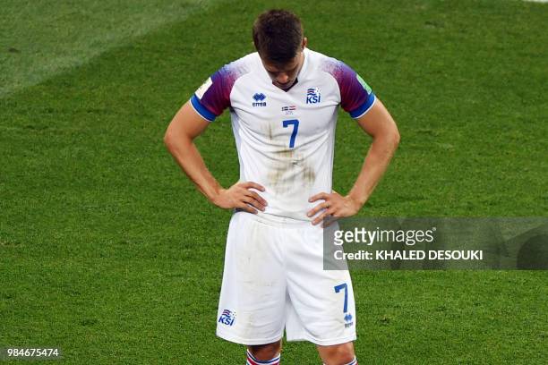 Iceland's midfielder Johann Gudmundsson reacts at the end of the Russia 2018 World Cup Group D football match between Iceland and Croatia at the...