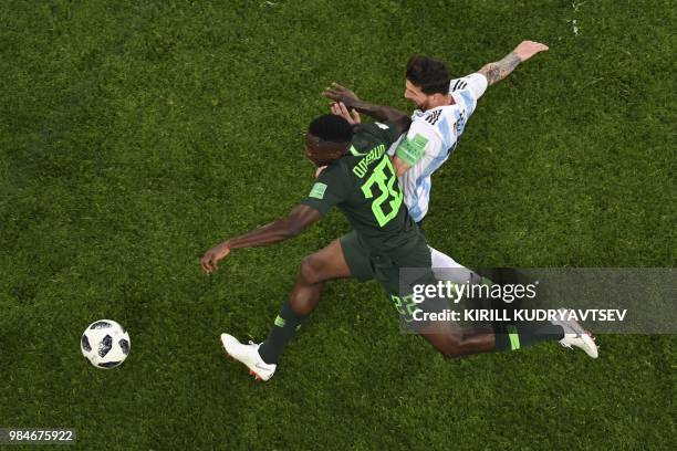 Nigeria's defender Kenneth Omeruo and Argentina's forward Lionel Messi compete for the ball during the Russia 2018 World Cup Group D football match...