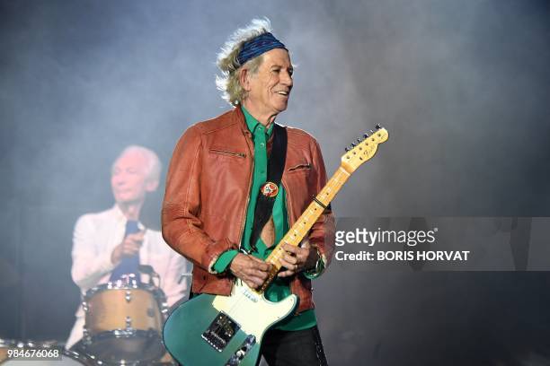 British musicians Charlie Watts and Keith Richards of The Rolling Stones perform during a concert at The Velodrome Stadium in Marseille on June 26 as...