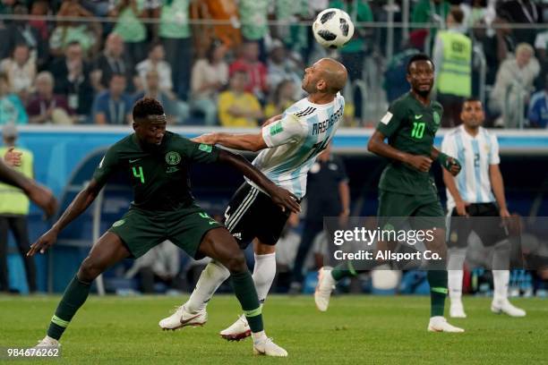 Javier Mascherano of Argentina competes with Wilfred Ndidi of Nigeria for the ball during the 2018 FIFA World Cup Russia group D match between...