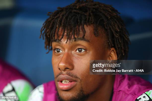 Alex Iwobi of Nigeria looks on from the bench during the 2018 FIFA World Cup Russia group D match between Nigeria and Argentina at Saint Petersburg...