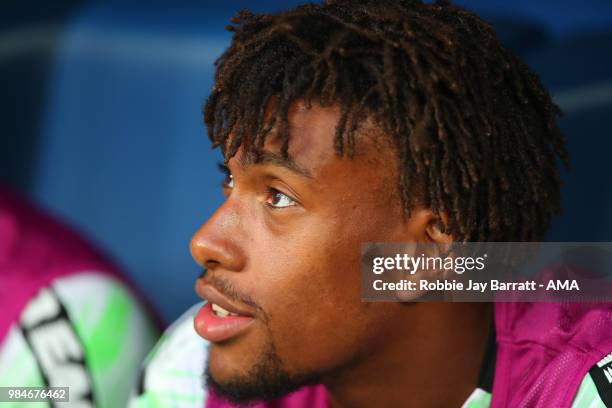 Alex Iwobi of Nigeria looks on from the bench during the 2018 FIFA World Cup Russia group D match between Nigeria and Argentina at Saint Petersburg...