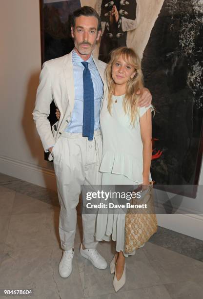 Richard Biedul and Melissa Tarling attend a private view of the "Michael Jackson: On The Wall" exhibition sponsored by HUGO BOSS at the National...