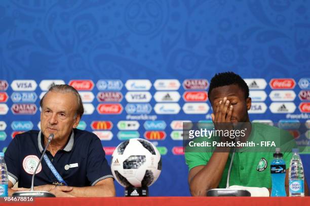 Gernot Rohr, Manager of Nigeria and John Obi Mikel attend the post match press conference following the 2018 FIFA World Cup Russia group D match...