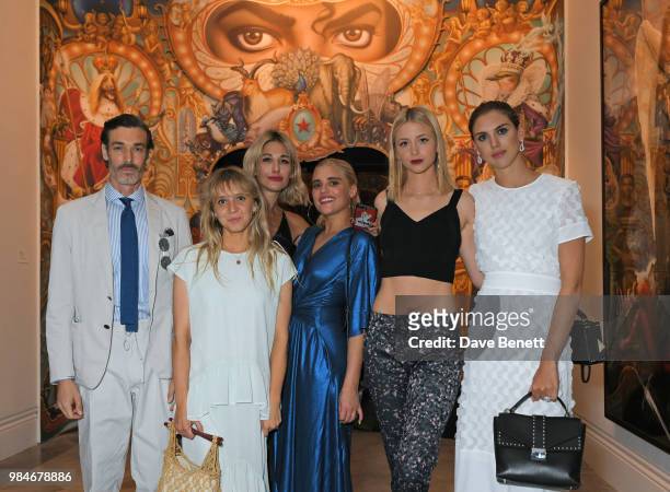 Richard Biedul, Melissa Tarling, Sophie Ball, Tigerlily Taylor, Isabel Getty and Sabrina Percy attend a private view of the "Michael Jackson: On The...