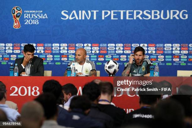 Jorge Sampaoli, Head coach of of Argentina and Nahuel Guzman of Lionel Messi attend the post match press conference following the 2018 FIFA World Cup...