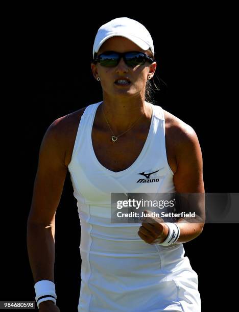 Arina Rodionova of Australia celebrates against Jaqueline Cristian of Romania during Wimbledon Championships Qualifying - Day 2 at The Bank of...