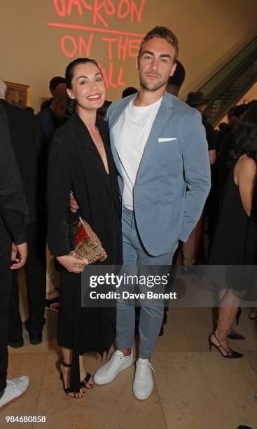 Tom Austen attends a private view of the "Michael Jackson: On The Wall" exhibition sponsored by HUGO BOSS at the National Portrait Gallery on June...