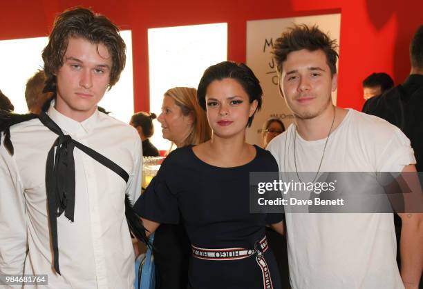 Hucci, Bip Ling and Brooklyn Beckham attend a private view of the "Michael Jackson: On The Wall" exhibition sponsored by HUGO BOSS at the National...