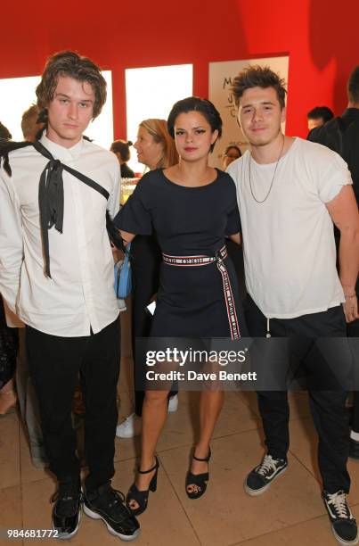 Hucci, Bip Ling and Brooklyn Beckham attend a private view of the "Michael Jackson: On The Wall" exhibition sponsored by HUGO BOSS at the National...