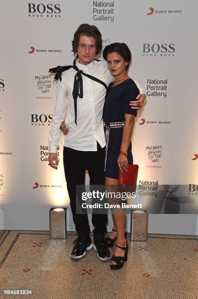 Hucci and Bip Ling attend a private view of the "Michael Jackson: On The Wall" exhibition sponsored by HUGO BOSS at the National Portrait Gallery on...