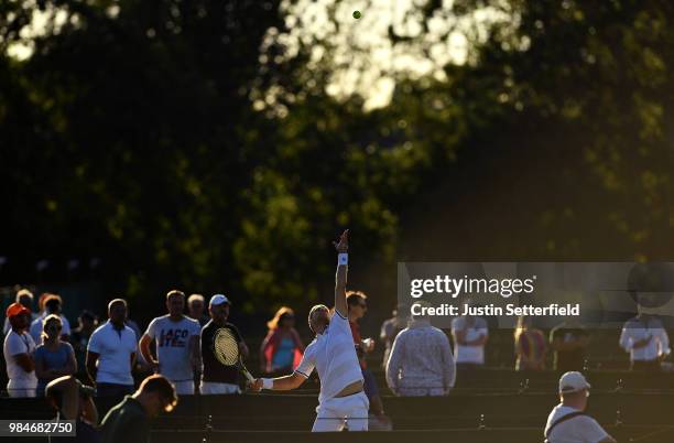 Stefano Napolitano of Italy serves against Salvatore Caruso of Italy during Wimbledon Championships Qualifying - Day 2 at The Bank of England Sports...