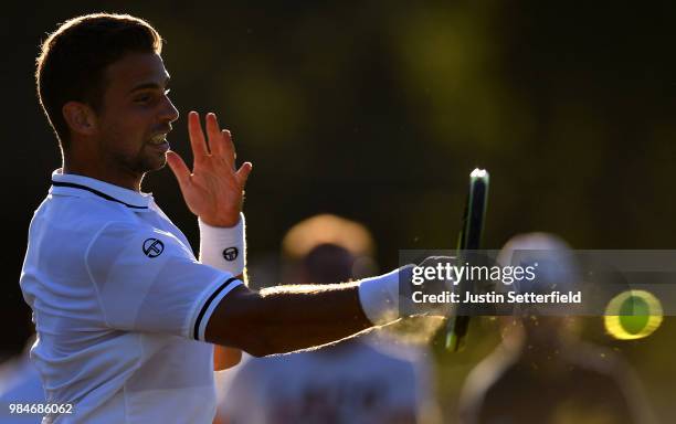 Stefano Napolitano of Italy plays a forehand against Salvatore Caruso of Italy during Wimbledon Championships Qualifying - Day 2 at The Bank of...