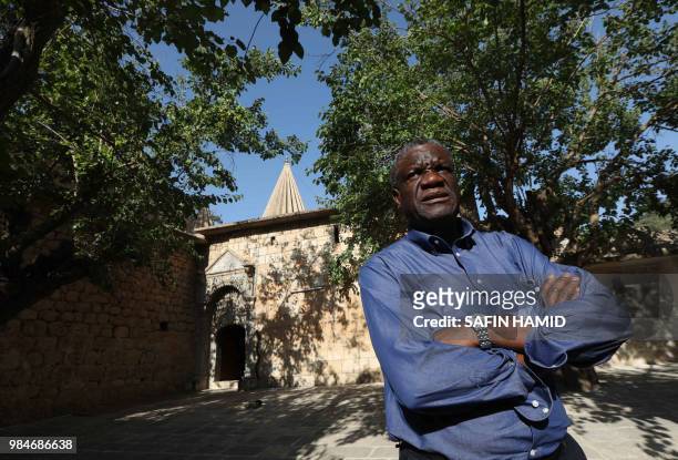 Congolese gynaecologist Denis Mukwege is photographed at Lalish temple in a valley near Dohuk, 430 km northwest of the Iraqi capital Baghdad, on June...