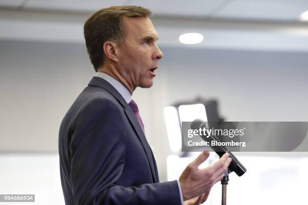 Bill Morneau, Canada's minister of finance, speaks during a press conference following a meeting with provincial and territorial finance ministers in...