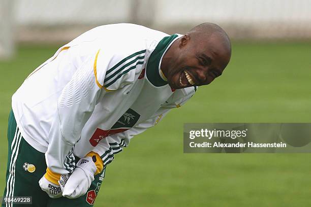 Siyabonga Nomvete of the South African national football team laughs during a training session of the South African national football team on April...