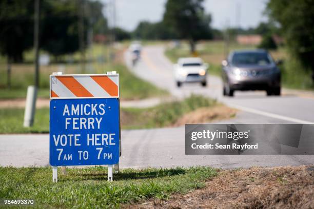 Traffic passes a polling place during a primary runoff election on June 26, 2018 in Chapin, South Carolina. The most notable race is for governor,...