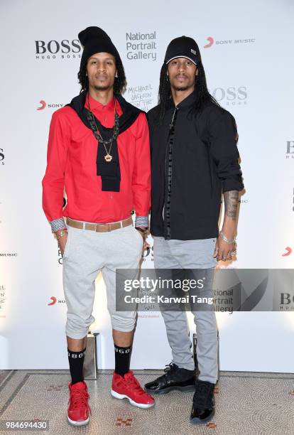 Laurent Nicolas Bourgeois and Larry Nicolas Bourgeois of Les Twins attend the 'Michael Jackson: On The Wall' Private View sponsored by HUGO BOSS at...