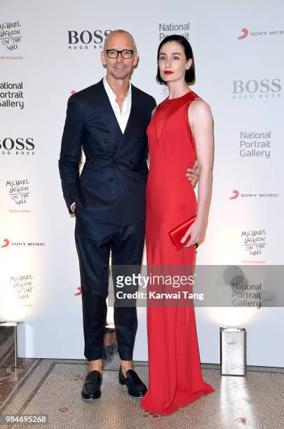 Erin O'Connor and Ingo Wilts, Chief Brand Officer for HUGO BOSS, attend the 'Michael Jackson: On The Wall' Private View sponsored by HUGO BOSS at the...