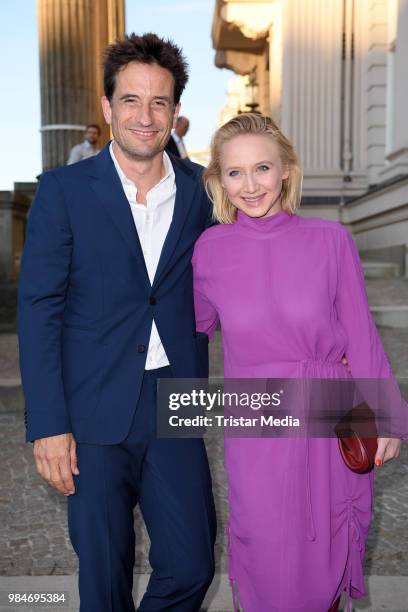 Oliver Mommsen and Anna Maria Muehe attend the BURDA Summer Party on June 26, 2018 in Berlin, Germany.