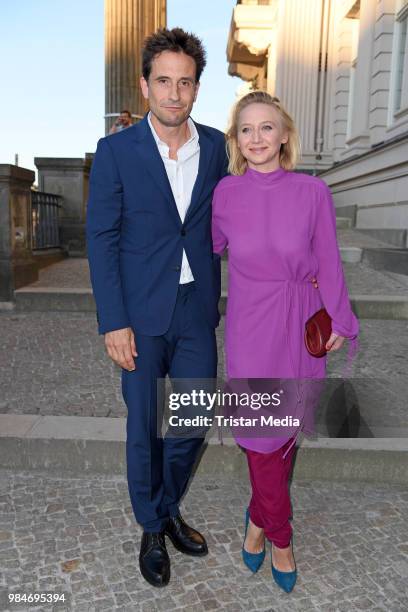 Oliver Mommsen and Anna Maria Muehe attend the BURDA Summer Party on June 26, 2018 in Berlin, Germany.