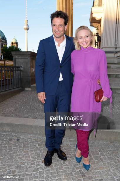 Oliver Mommsen and Anna Maria Muehe attend the BURDA Summer Party on June 26, 2018 in Berlin, Germany.