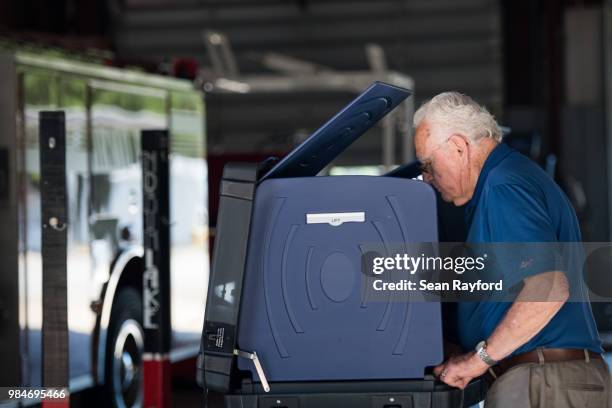 Man casts a vote during a primary runoff election on June 26, 2018 in Irmo, South Carolina. The most notable race is for Governor, featuring...