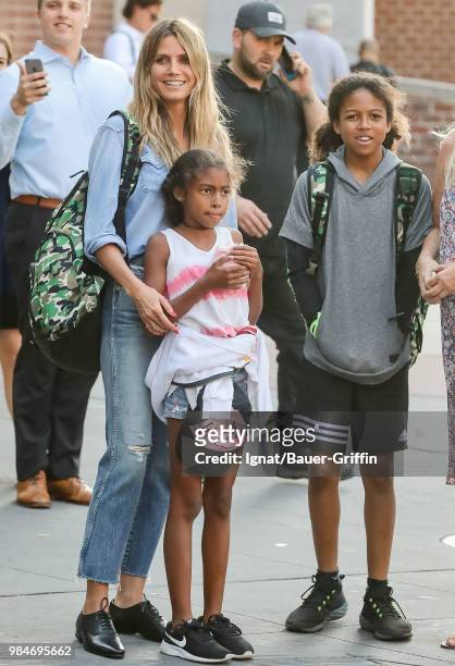 Heidi Klum and her children Johan and Lou are seen on June 26, 2018 in New York City.