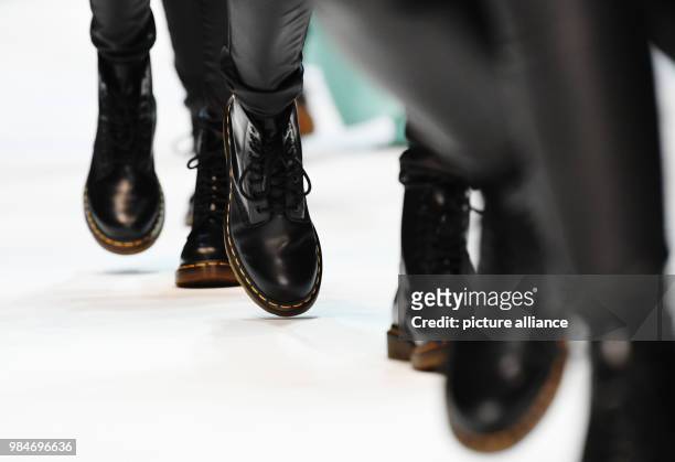 Models wearing Dr. Martens boots at the presentation of the Fall/Winter 2018 collection of the Italian fashion label "Cashmere Victim" during Fashion...