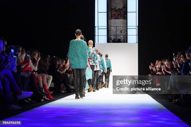 Models present the Fall/Winter 2018 collection of the Italian fashion label "Cashmere Victim" during Fashion Week in Berlin, Germany, 16 January...