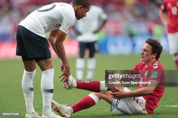 Forward Kylian Mbappe of France and midfielder Thomas Delaney of Denmark during the Group C the 2018 FIFA World Cup soccer match between Denmark and...