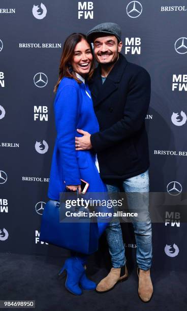 Jana Ina and Giovanni Zarrella arrive for the Riani fashion show during the Mercedes Benz Fashion Week at the ewerk in Berlin, Germany, 16 January...