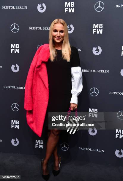 Actress Caroline Beil arrives for the Riani fashion show during the Mercedes Benz Fashion Week at the ewerk in Berlin, Germany, 16 January 2018....