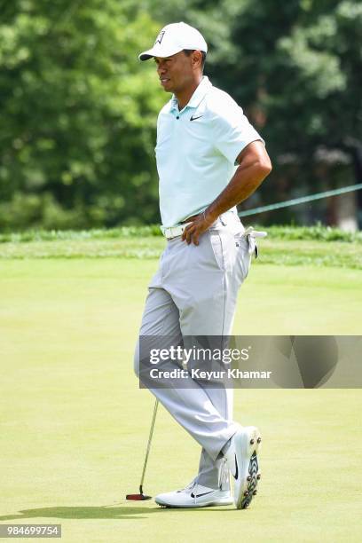 Tiger Woods holds TaylorMade Ardmore 3 mallet putter on the 16th hole during practice for the Quicken Loans National at TPC Potomac at Avenel Farm on...