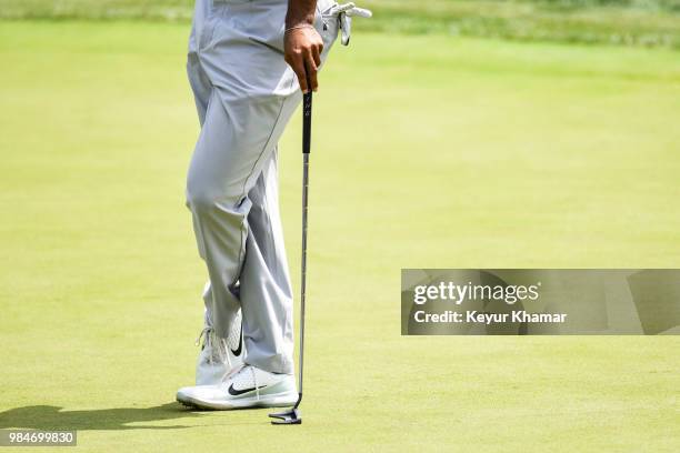 Detail shot as Tiger Woods holds a TaylorMade Ardmore 3 mallet putter on the 16th hole during practice for the Quicken Loans National at TPC Potomac...