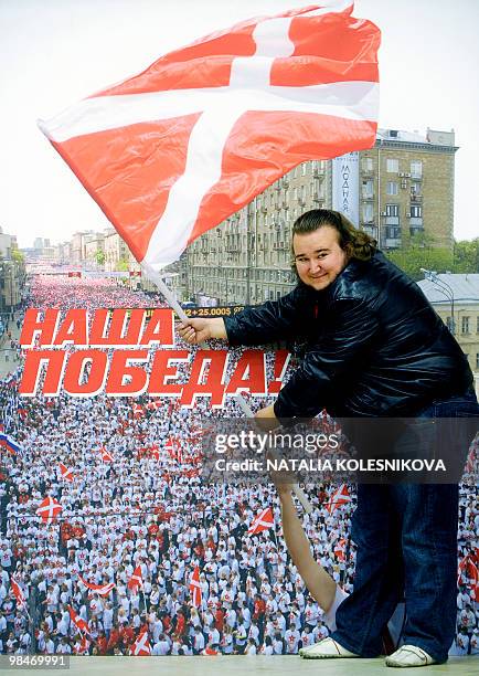 Member of the pro-Kremlin youth group Nashi poses for photographers during their fifth congress in Moscow on April 15, 2010. AFP PHOTO / NATALIA...