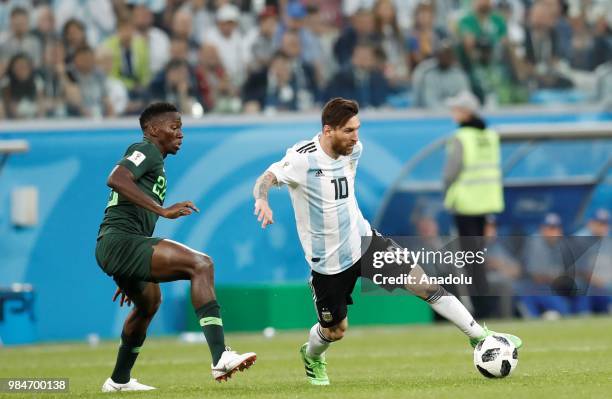 Lionel Messi of Argentina in action against Kenneth Omeruo of Nigeria during the 2018 FIFA World Cup Russia Group D match between Nigeria and...