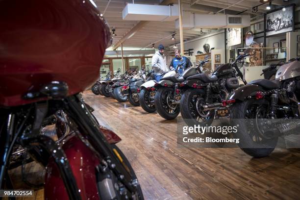 Customers view Harley-Davidson Inc. Motorcycles at the company's dealership in South San Francisco, California, U.S., on Tuesday, June 26, 2018....