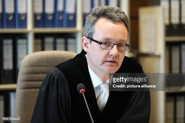 Michael Greve, presiding judge in the trial on the collapse of the Cologne City Archive, sitting in a courtroom of the District Court in Cologne,...