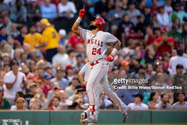 Chris Young of the Los Angeles Angels of Anaheim reacts after hitting a solo home run during the third inning of a game against the Boston Red Sox on...