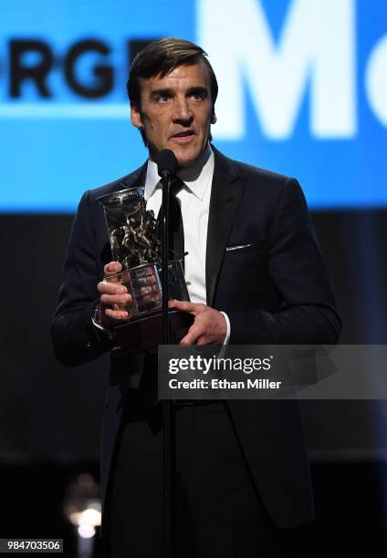 Vegas Golden Knights President of Hockey Operations and general manager George McPhee accepts the NHL General Manager of the Year Award during the...