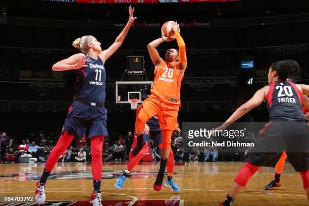 Alex Bentley of the Connecticut Sun shoots the ball against the Washington Mystics on June 26, 2018 at Capital One Arena in Washington, DC. NOTE TO...